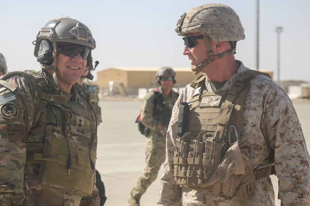 U.S. Army Maj. Gen. Christopher K. Haas, the deputy chief of staff of Resolute Support Mission, speaks with U.S. Marine Col. Matthew Reid, the deputy commander of Task Force Southwest, at Bastion Airfield, Afghanistan, Aug. 29, 2017. U.S. Army Gen. John W. Nicholson, the commanding general of Resolute Support Mission, visited with Task Force Southwest and Afghan leaders from Helmand province to discuss recent operational progress. (U.S. Marine Corps photo by Sgt. Lucas Hopkins)