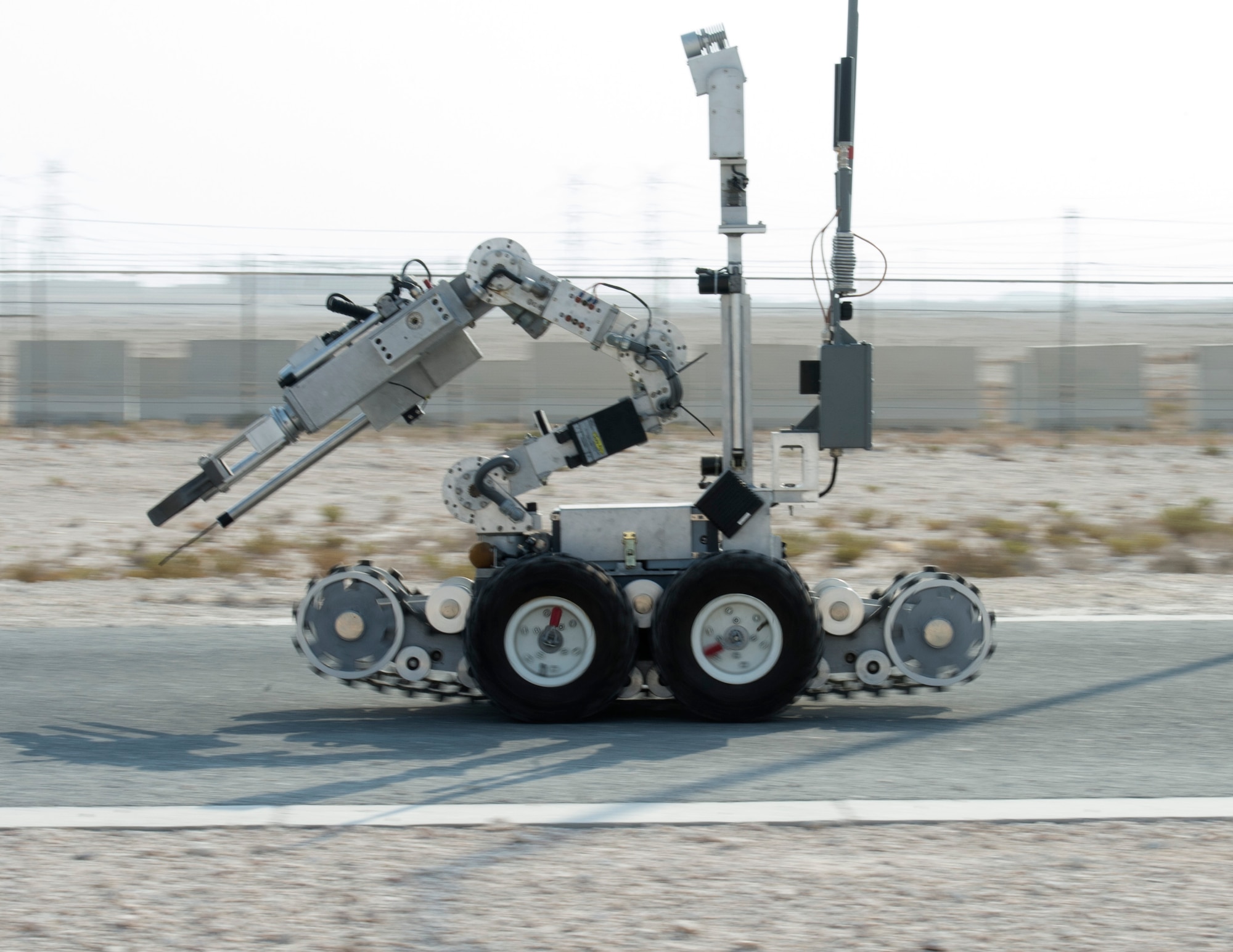A Remotec ANDROS F6A heavy-duty robot with the 379th Expeditionary Civil Engineer Squadron Explosive Ordnance Disposal Flight travels to the vehicle search exercise location at Al Udeid Air Base, Qatar, Aug. 26, 2017.