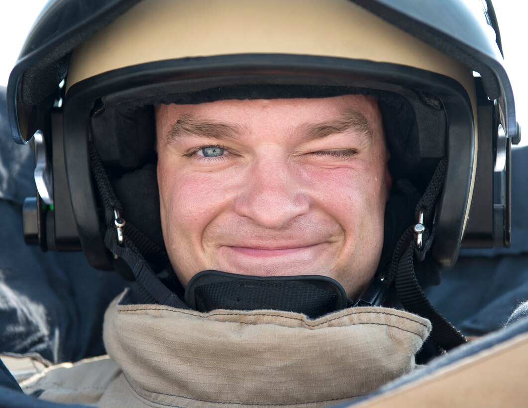 U.S. Air Force Staff Sgt. Brian Vosper, team leader with the 379th Expeditionary Civil Engineer Squadron Explosive Ordnance Disposal Flight, waits as his team members secure has bomb suit at Al Udeid Air Base, Qatar, Aug. 26, 2017.