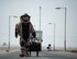 U.S. Air Force Staff Sgt. Brian Vosper, team leader with the 379th Expeditionary Civil Engineer Squadron Explosive Ordnance Disposal Flight, walks to the vehicle search exercise location at Al Udeid Air Base, Qatar, Aug. 26, 2017. Vosper is taking part in a vehicle search exercise where Mmaura, a military working dog with the 379th Expeditionary Security Forces Squadron, detected something abnormal with the vehicle. (U.S. Air Force photo by Tech. Sgt. Amy M. Lovgren)