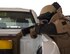 U.S. Air Force Staff Sgt. Brian Vosper, team leader with the 379th Expeditionary Civil Engineer Squadron Explosive Ordnance Disposal Flight, places an x-ray panel behind a simulated explosive device at Al Udeid Air Base, Qatar, Aug. 26, 2017. Vosper is taking part in a vehicle search exercise where Mmaura, a military working dog with the 379th Expeditionary Security Forces Squadron, detected something abnormal with the vehicle. (U.S. Air Force photo by Tech. Sgt. Amy M. Lovgren)