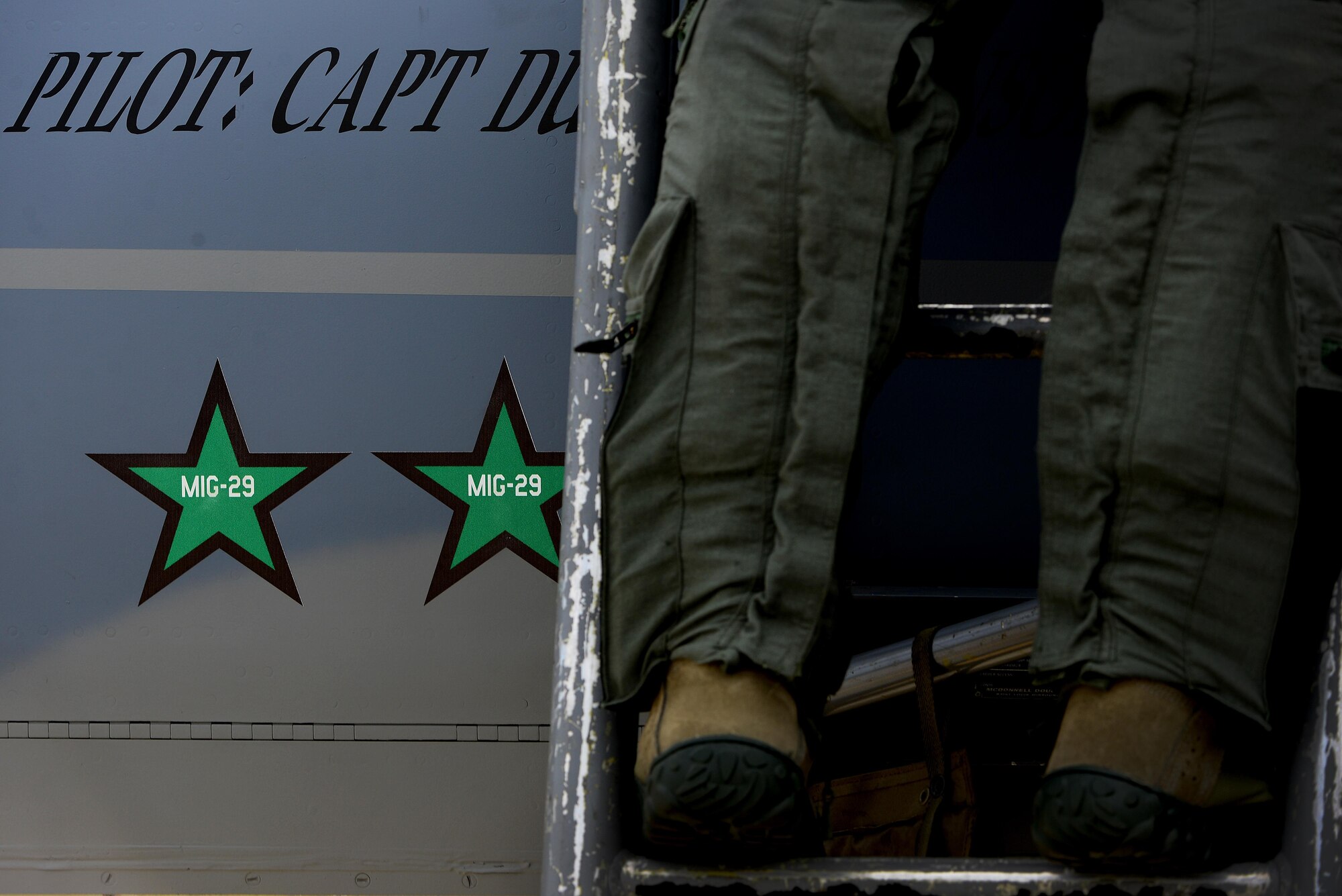 A U.S. Air Force F-15C Eagle pilot from the 493rd Expeditionary Fighter Squadron steps down from his aircraft after arriving at Siauliai Air Base, Lithuania Aug. 29. The United States Air Force is scheduled to assume control of the NATO Baltic Air Policing mission from the Polish air force during a hand-over ceremony on Aug. 30. (U.S. Air Force photo/ Tech. Sgt. Matthew Plew)