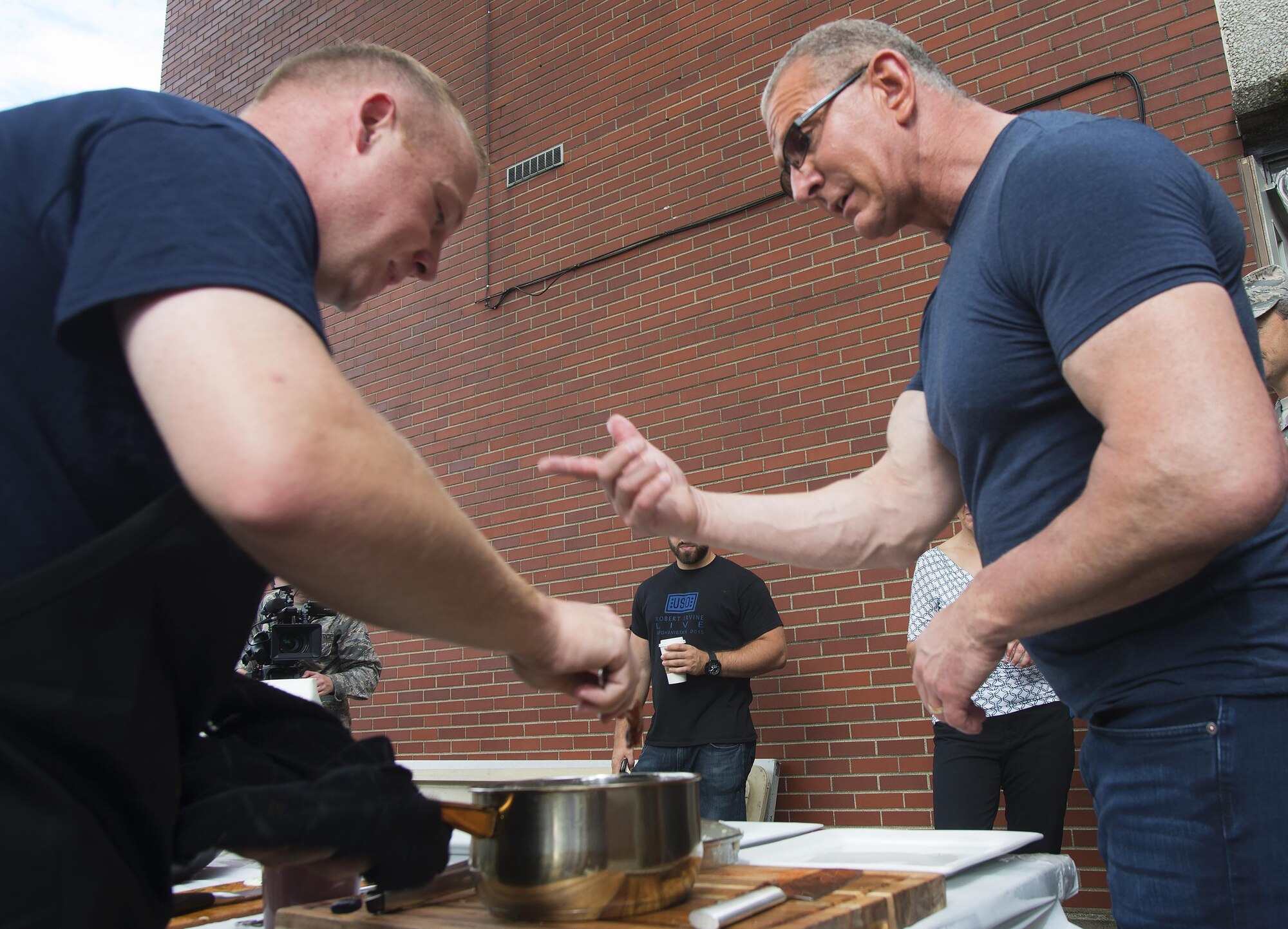 Celebrity Chef Robert Irvine with Master Sgt. Jacob Hellickson