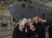 Radio City Rockettes pose for a selfie in front of a 445th Airlift Wing C-17 Globemaster III aircraft during a visit to one of the wing’s hangars at Wright-Patterson Air Force Base, Ohio, Aug. 22, 2017. The dance troupe’s tour of the base was part of a USO sponsored visit which included a show in the base’s theater and a dance class for Wright-Patterson dependents. (U.S. Air Force photo by R.J. Oriez)