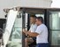 Brig. Gen. Derek C. France, left, 380th Air Expeditionary Wing commander, learns to drive a forklift from Airman 1st Class Cristian Narino Garcia, 380th Expeditionary Force Support Squadron services journeyman, Aug. 31, 2017, at Al Dhafra Air Base, United Arab Emirates. Narino Garcia guided France through the transport of several pallets. (U.S. Air Force photo by Senior Airman Preston Webb)