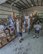 380th Air Expeditionary Wing leadership helps 380th Force Support Squadron personnel unload pallets of food Aug. 31, 2017, at Al Dhafra Air Base, United Arab Emirates. Wing leadership spent the morning helping Airmen at Roy’s Flightline Kitchen unload, sort, and put away food that fuels the mission. (U.S. Air Force photo by Senior Airman Preston Webb)