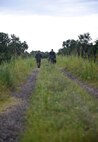 Airmen walking down road