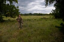 Airman walking through field
