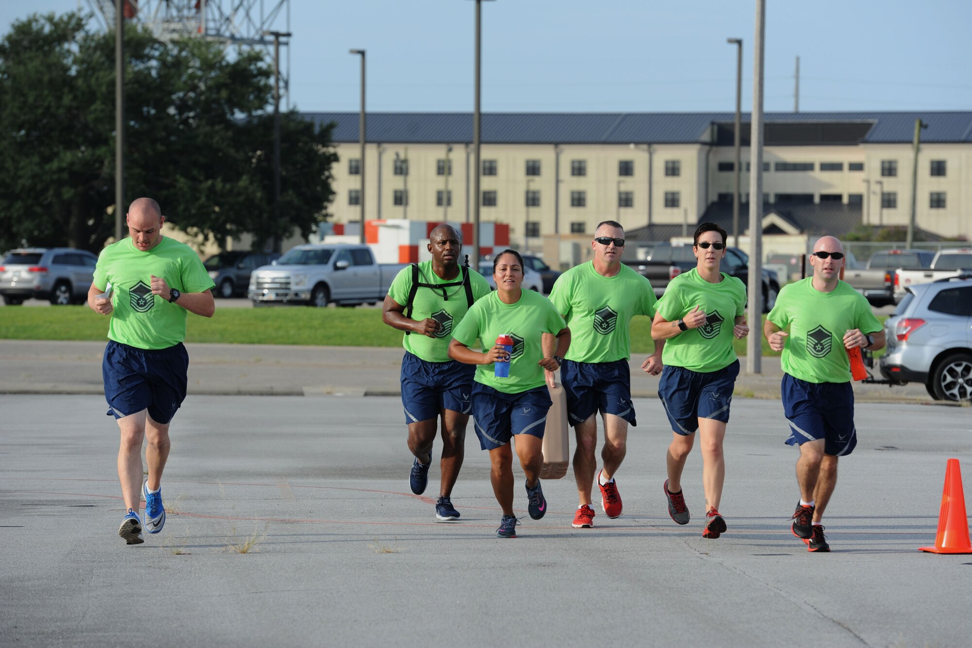 Team Rooftop run toward the next challenge during the Senior Noncommissioned Officer  Professional Enhancement Seminar Warrior Challenge Aug. 25, 2017, on Keesler Air Force Base, Mississippi. Keesler’s newest SNCOs also participated in physical strength activities as well as answering trivia questions about Keesler AFB and enlisted history. (U.S. Air Force photo by Kemberly Groue)