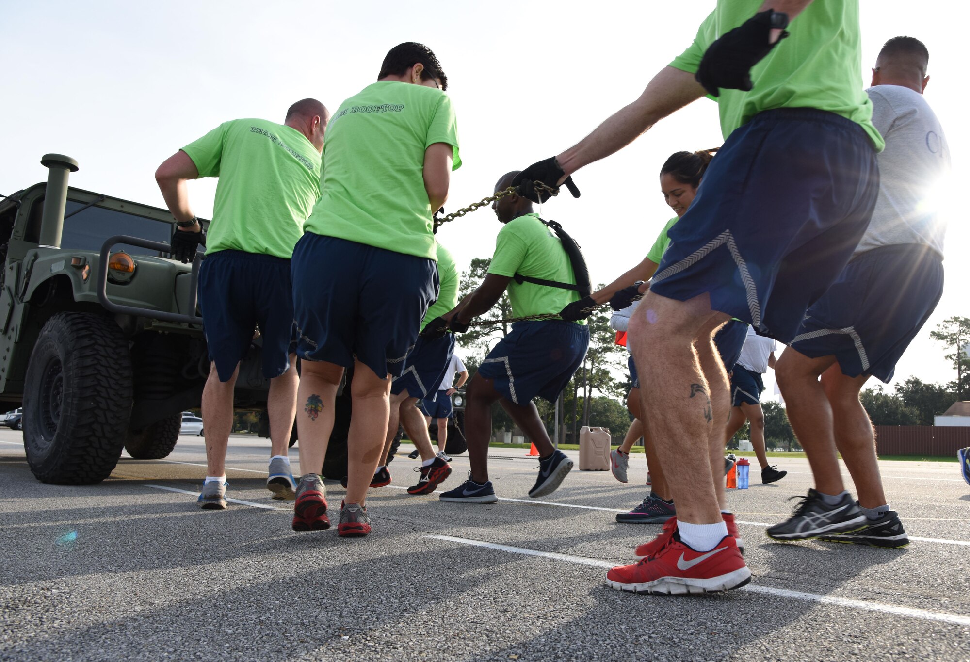 Team Rooftop participate in a Humvee pull during the Senior Noncommissioned Officer Professional Enhancement Seminar Warrior Challenge Aug. 25, 2017, on Keesler Air Force Base, Mississippi. Keesler’s newest SNCOs also participated in physical strength activities as well as answering trivia questions about Keesler AFB and enlisted history. (U.S. Air Force photo by Kemberly Groue)