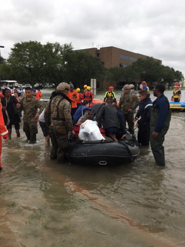 Marines with 4th Reconnaissance Battalion, 4th Marine Division, Marine Forces Reserve, participate in rescue operations in response to Hurricane Harvey in Katy, Texas, Aug. 30, 2017. Marine Forces Reserve is posturing ground, air and logistical assets in order to support FEMA, state and local response efforts due to Hurricane Harvey. The Marine Corps Reserve is America’s expeditionary total force in readiness whether on the battlefield or during national emergencies.