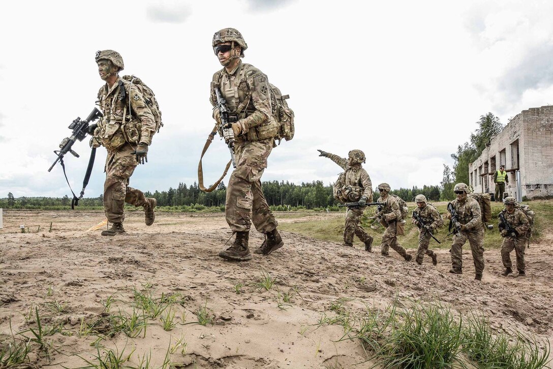 U.S. soldiers compete in the Lithuanian Best Infantry Squad Competition at Rukla Training Area, Lithuania