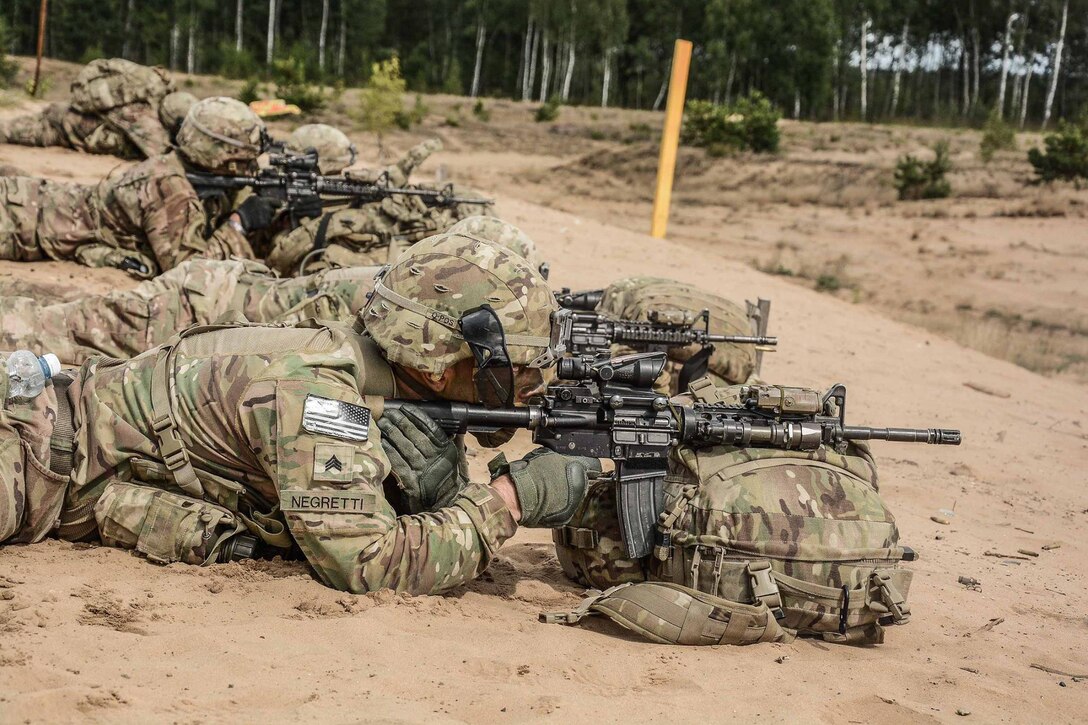 U.S. soldiers compete in the Lithuanian Best Infantry Squad Competition at Rukla Training Area, Lithuania