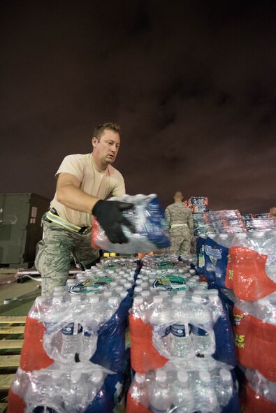 Airmen from the Kentucky Air National Guard’s 123rd Contingency Response Group, augmented by Airmen from the Mississippi ANG, establish an air cargo and aeromedical evacuation hub at George Bush Intercontinental Airport in Houston, Aug. 30, 2017, in support of Hurricane Harvey relief efforts. The Airmen will transfer patients from ambulances and prepare them for air movement so they can be flown by military aircraft to appropriate health care facilities. (U.S. Air National Guard photo/Staff Sgt. Joshua Horton)