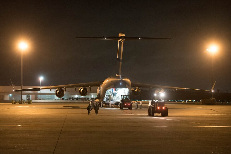 Airmen from the Kentucky Air National Guard’s 123rd Contingency Response Group, augmented by Airmen from the Mississippi ANG, offload 45 tons of support equipment from a C-17 Globemaster III aircraft at George Bush Intercontinental Airport in Houston, Aug. 30, 2017, in support of Hurricane Harvey relief efforts. The Airmen established an air cargo and aeromedical evacuation hub to facilitate the safe evacuation of medical patients and the arrival of humanitarian assistance. (U.S. Air National Guard photo/Staff Sgt. Joshua Horton)