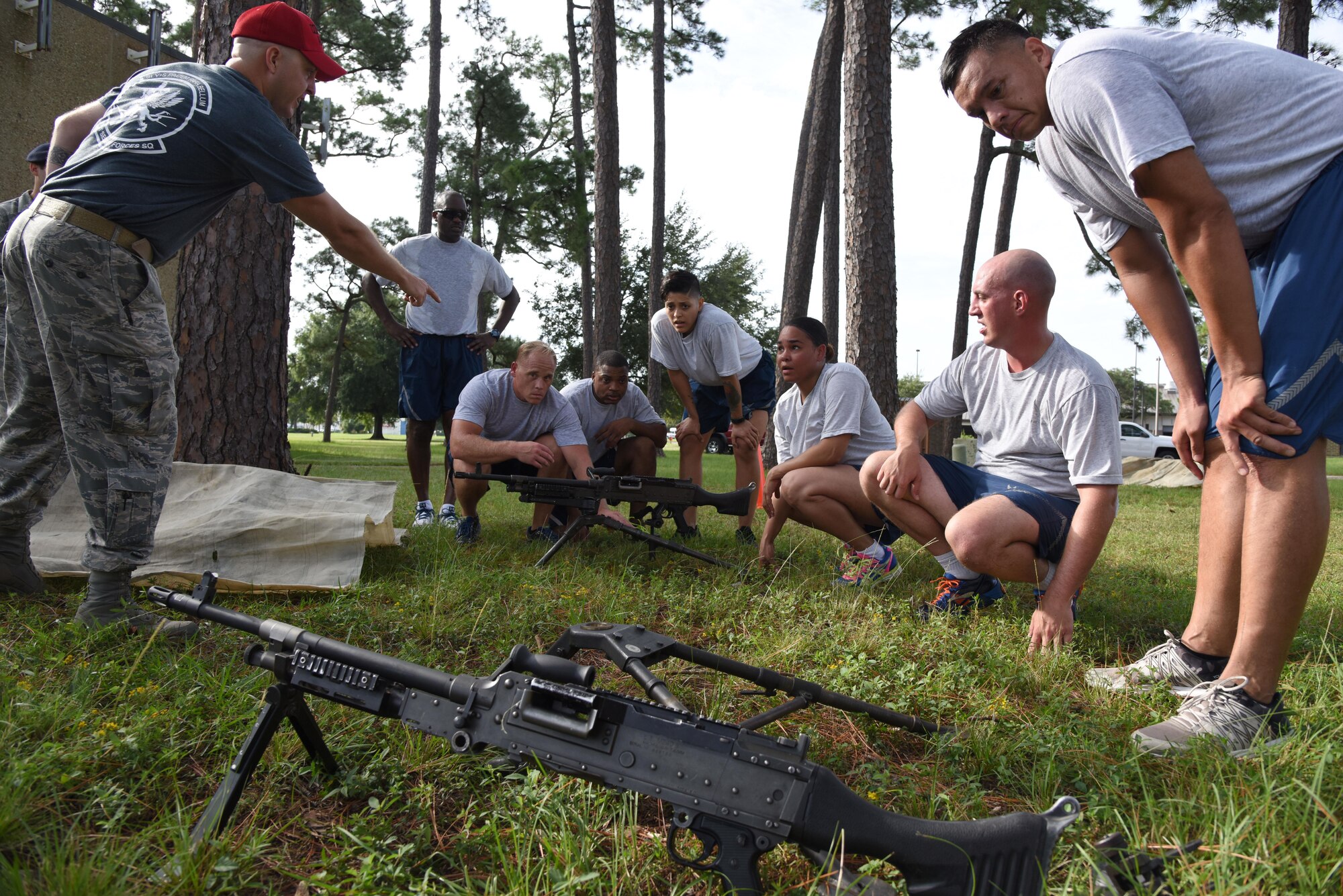 Team Five prepares to mount a 240B machine gun weapon during the Senior NCO Professional Enhancement Seminar Warrior Challenge Aug. 25, 2017, on Keesler Air Force Base, Mississippi. Keesler’s newest SNCOs also participated in physical strength activities as well as answering trivia questions about Keesler AFB and enlisted history. (U.S. Air Force photo by Kemberly Groue)