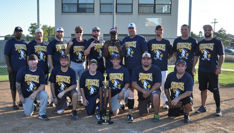 The Swingers gather at home plate Aug. 17 after winning two finals games, 20-15 and 10-6, against Davy Jones for the 2017 Intramural Softball League base championship.