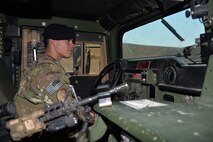 Airman 1st Class Dillan Caceres, 341st Missile Security Forces Squadron response force leader, sits in a Humvee at a missile alert facility Aug. 28, 2017, near Belt, Mont.