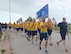 Chiefs and chief selects run in formation around the TACAMO complex during the Howie Shapiro 5K run Aug. 18 at Herc Park.