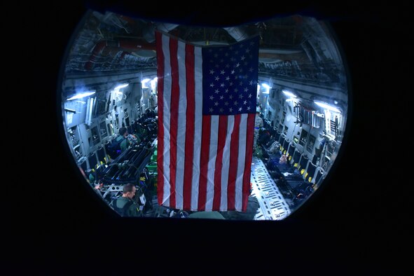 An American flag hangs in a C-17.