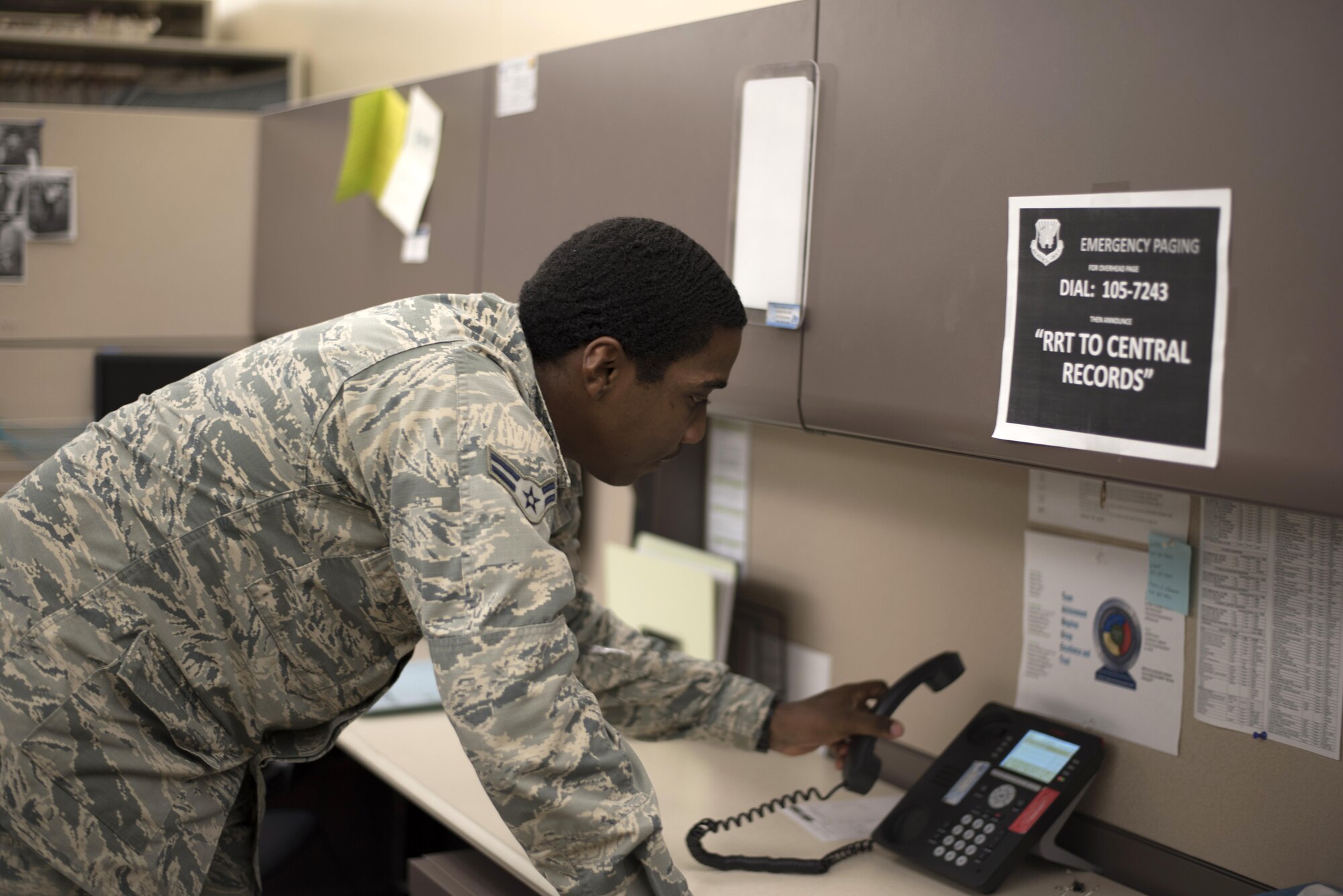 U.S. Air Force Airman 1st Class Amal Bonner, medical records technicians assigned to the 6th Medical Support Squadron, picks up the phone to talk to a customer at MacDill Air Force, Fla., Aug. 31, 2017.
