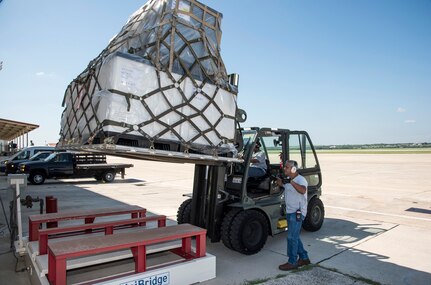502nd Logistics Readiness Squadron personnel load pallets containing medical supplies and equipment Aug. 30, 2017 at Joint Base San Antonio-Lackland, Texas.