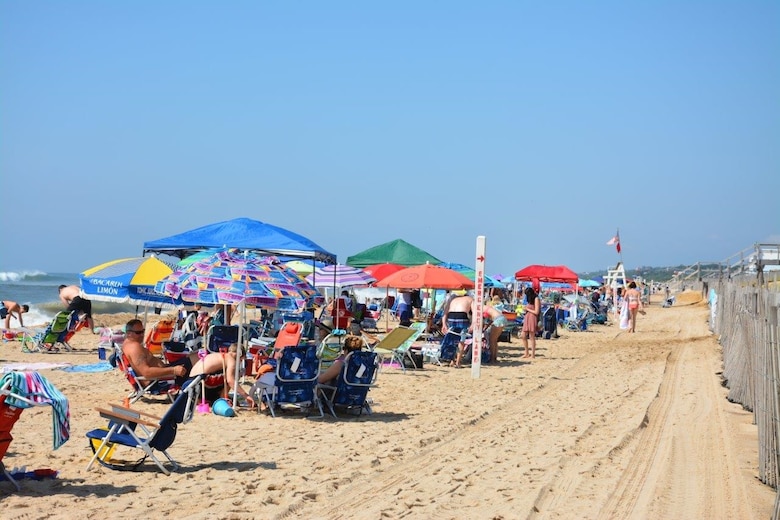 Beachgoers in Montauk, New York, on Long Island's east end, set up camp along the shore, August 16, 2017. A New York District flood-control project created a wider beach for summer recreation as a secondary benefit.