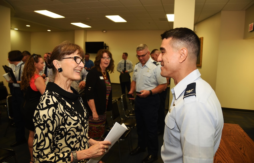 U.S. Air Force Col. Ricky Mills, 17th Training Wing commander, and Dr. Cheryl Sparks, Howard College president, discuss Public-Public and Public-Private program opportunities after the triannual P4 update meeting held at Judge Edd B. Keyes Building in San Angelo, Aug. 31, 2017.  P4 is a military installation and local community initiative to form partnerships that achieve value and benefit for both. (U.S. Air Force photo by Robert D. Martinez/Released)