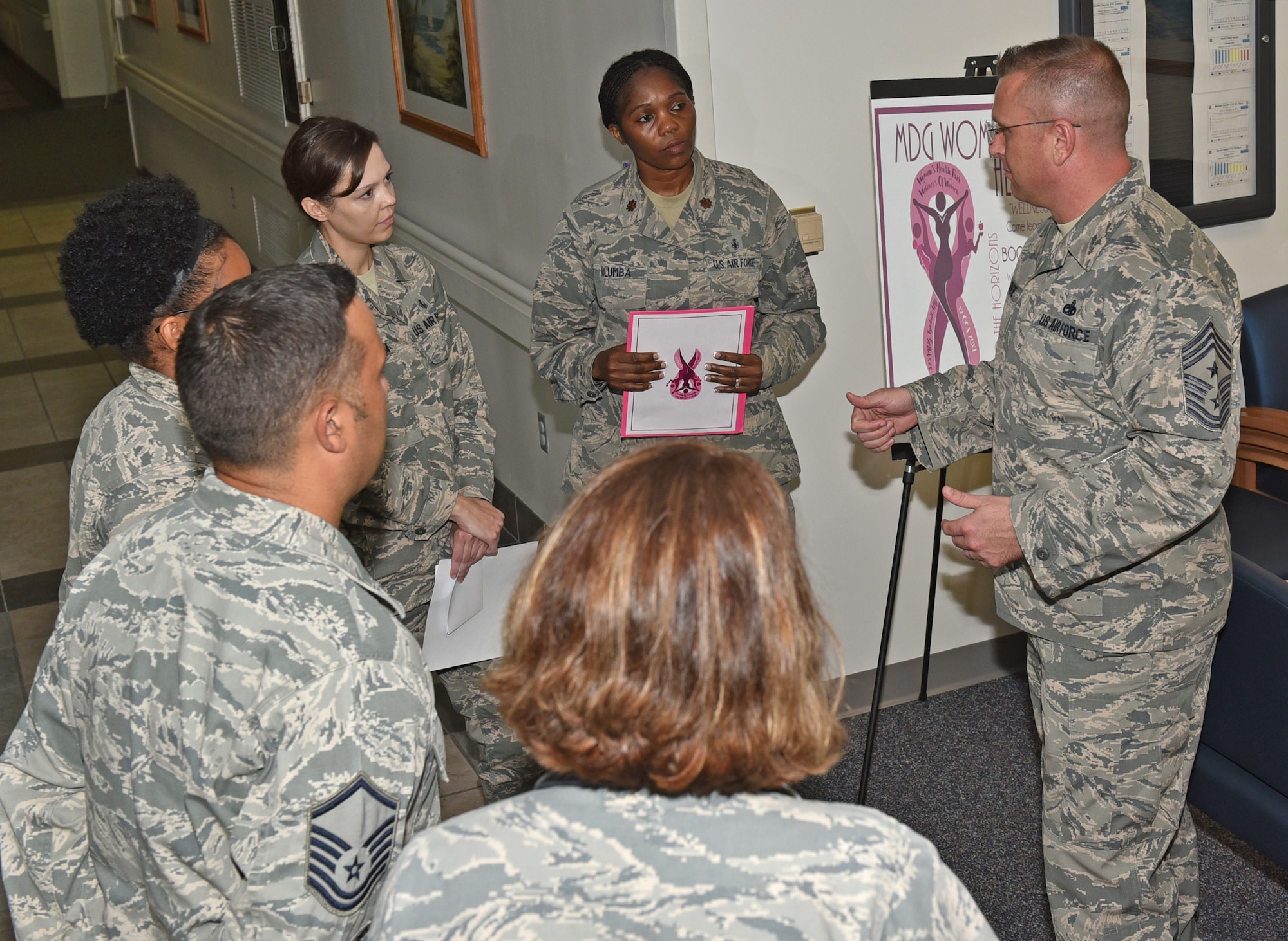 U.S. Air Force Chief Master Sgt. David W. Wade, 9th Air Force command chief at Shaw Air Force Base, S.C., briefs the Tyndall Air Force Base, Fla., 325th Medical Group members Aug. 29, 2017. Wade spent time at different units talking with Airmen and highlighting their place in the profession of arms and how their efforts affect the Tyndall mission. (U.S. Air Force photo by Senior Airman Sergio A. Gamboa/Released)
