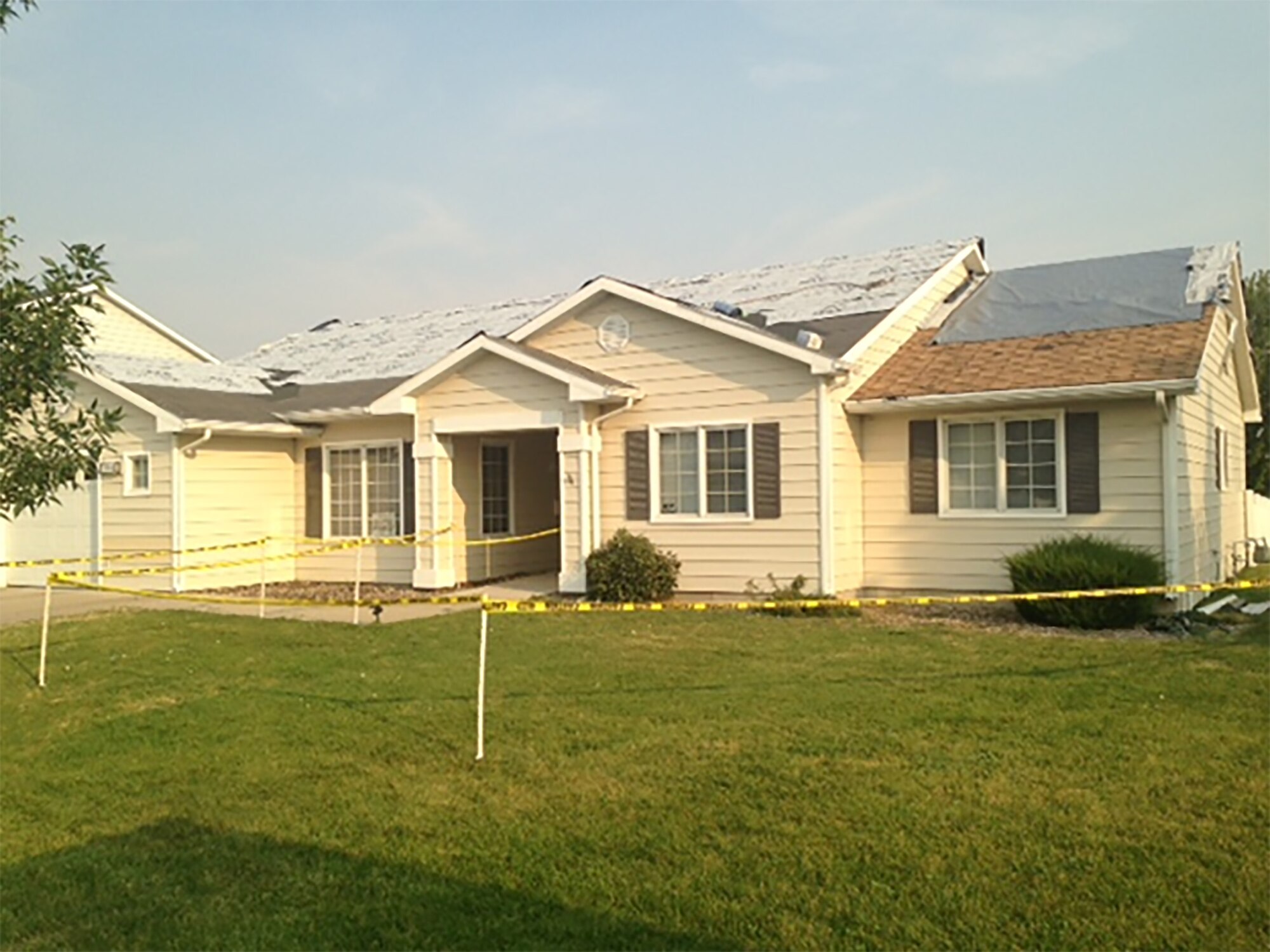 A roof is replaced on a home in base housing at Malmstrom Air Force Base, Mont. (Courtesy photo)