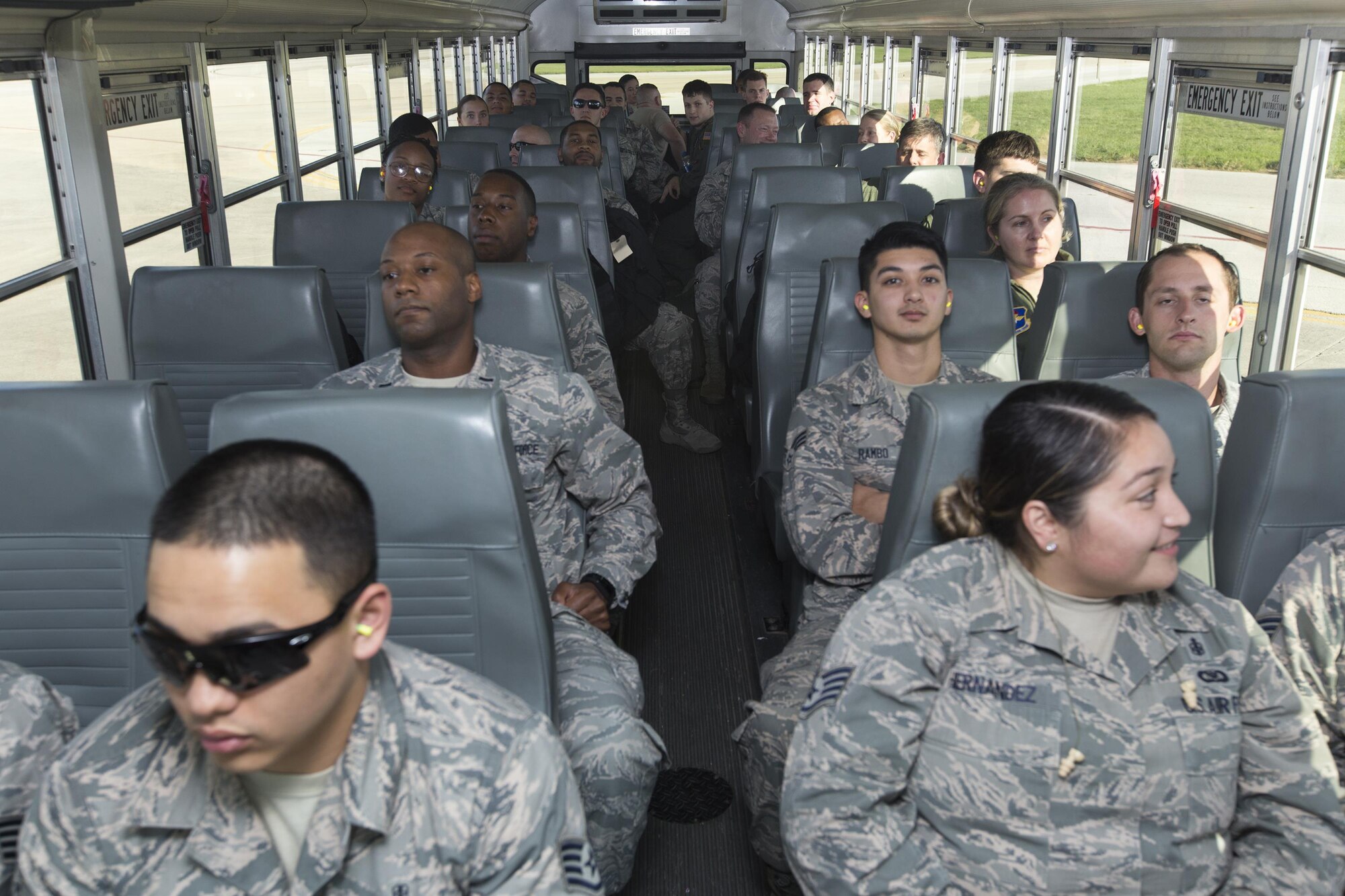 U.S. Air Force medical personnel board a military aircraft