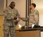Tech. Sgt. Nelson, who portrays a front-line supervisor, receives a pamphlet about free counseling from Master Sgt. Kelley who is portraying a First Sergeant Aug. 30, 2017 on Ellsworth Air Force Base. Nelson character does not like to receive outside help but realizes he cannot take on his problems alone. (U.S. Air Force photo by Airman 1st Class Thomas Karol)