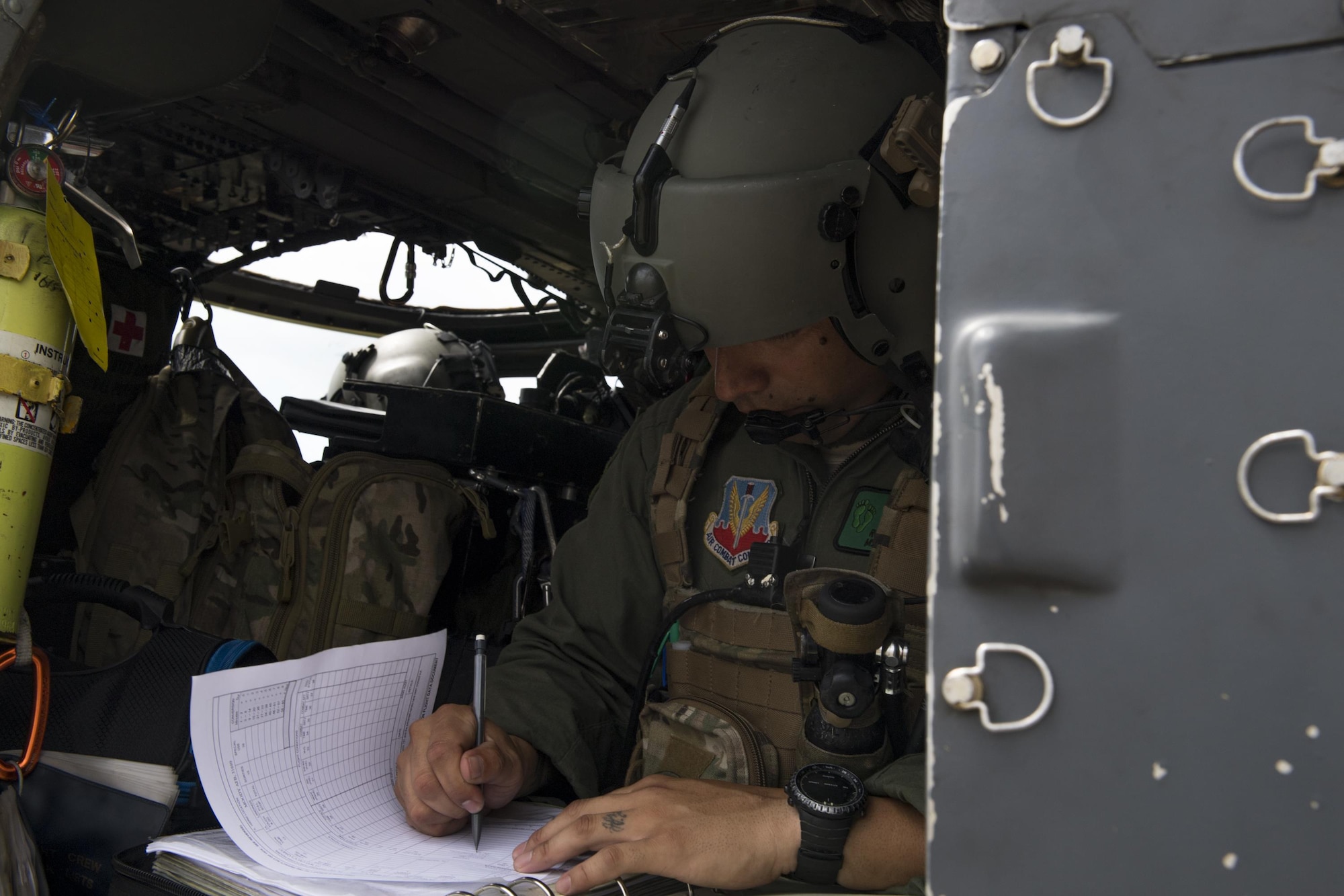A special missions aviator from the 41st Rescue Squadron, performs pre-flight checks, Aug. 30, 2017, at Easterwood Airport in College Station, Texas.