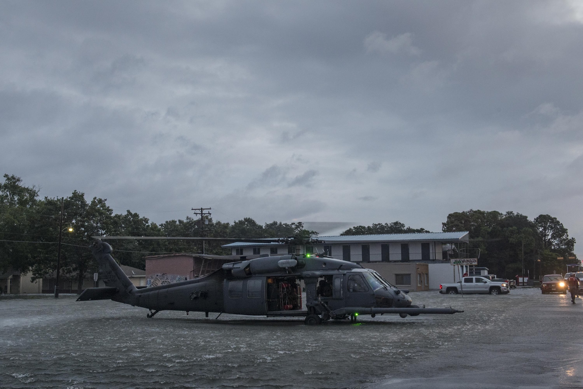 An HH-60G Pave Hawk, assigned to the 41st Rescue Squadron waits for an evacuee onload, Aug. 30, 2017, in the Houston, Texas area.