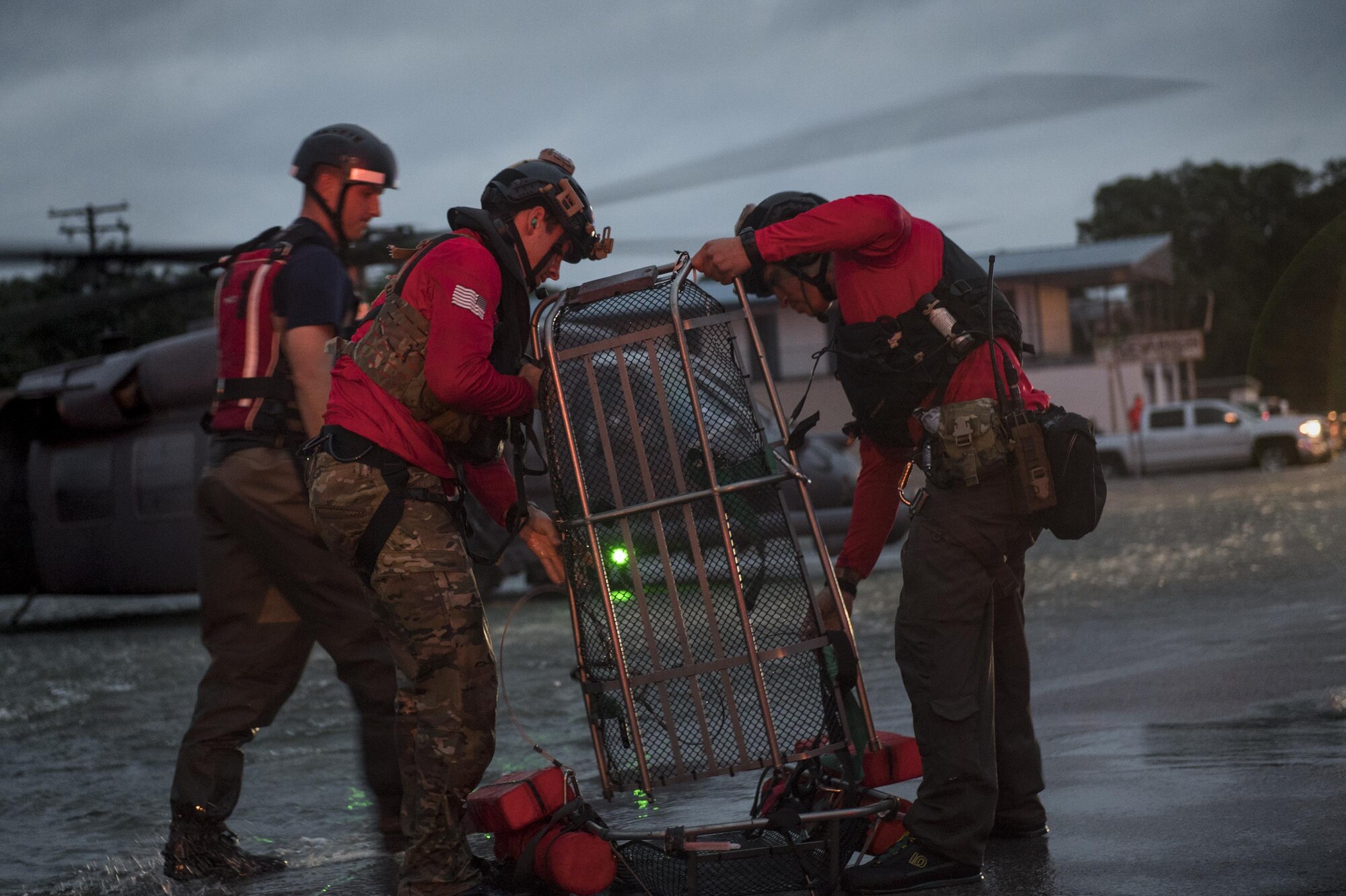 Pararescuemen from the 38th Rescue Squadron set up a basket to carry an evacuee, Aug. 30, 2017, in the Houston, Texas area.