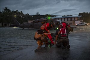 Pararescuemen from the 38th Rescue Squadron and local rescue assets, set up a basket to carry an evacuee, Aug. 30, 2017, in the Houston, Texas area.