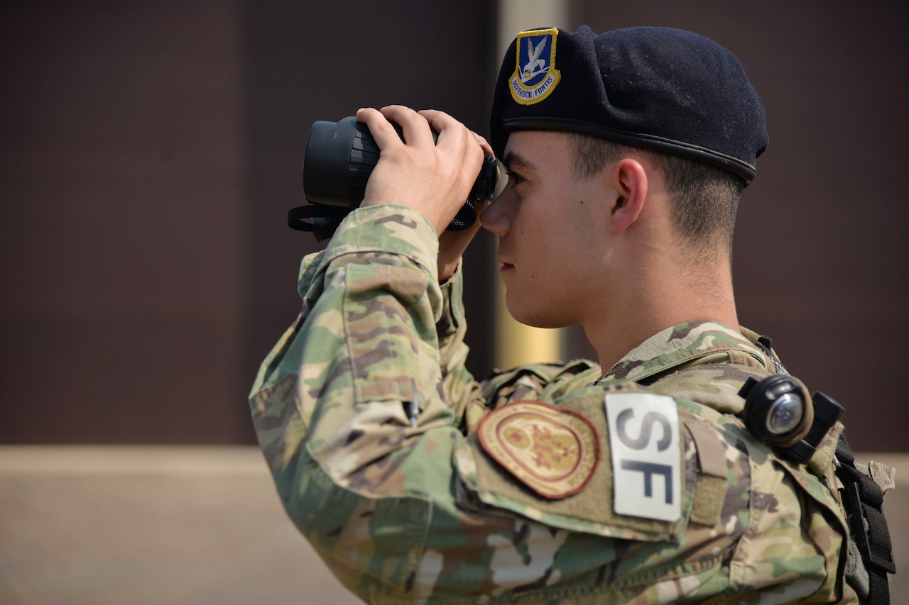 Airman 1st Class Dillan Caceres, 341st Missile Security Forces Squadron response force leader, performs a random antiterrorism measure at a missile alert facility Aug. 28, 2017, near Belt, Mont.
