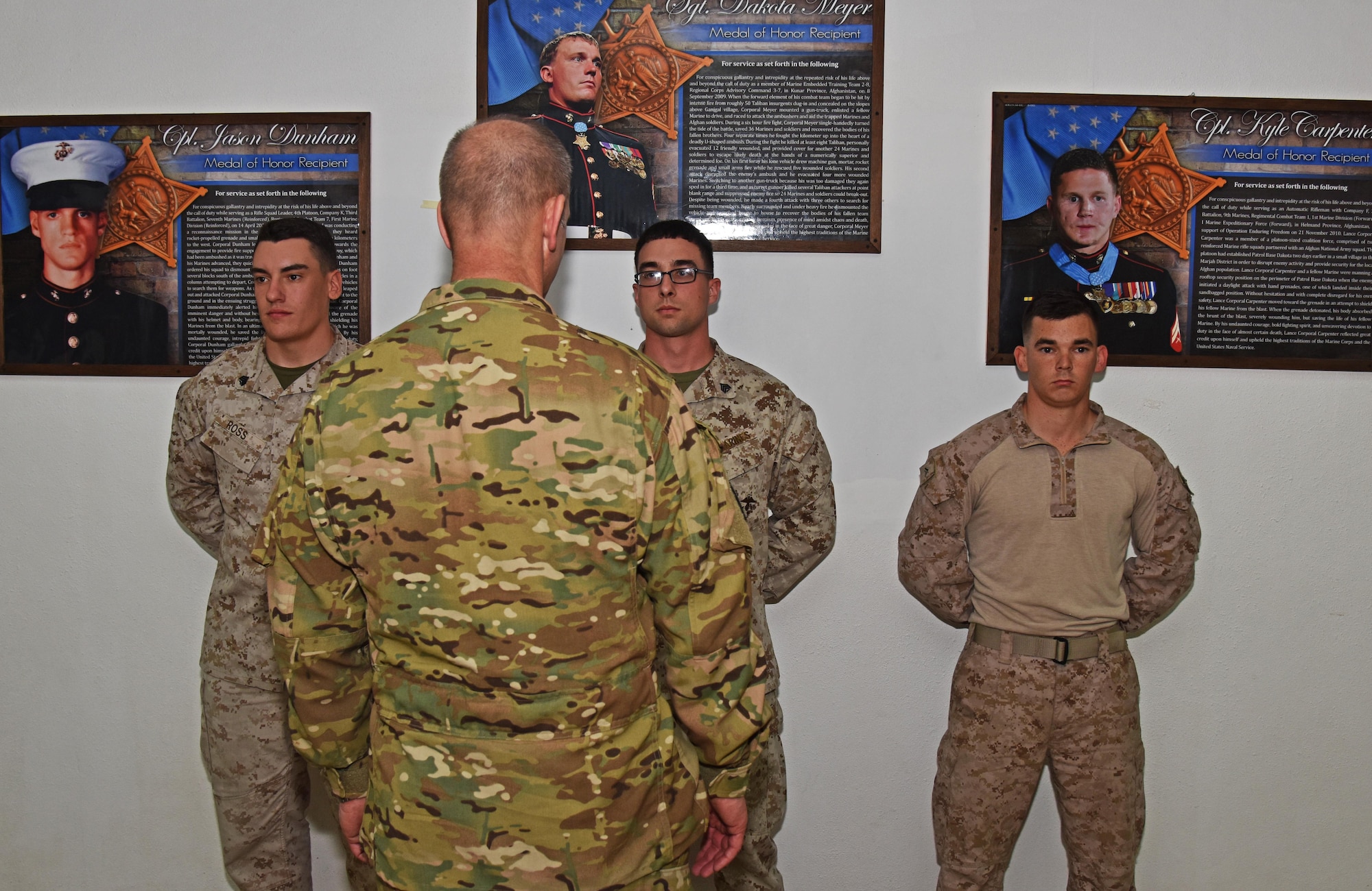 U.S. Air Force Maj. Gen. Dirk Smith, 9th Air Expeditionary Task Force-Levant Commander, meets with Marines at the 407th Air Expeditionary Group in Southwest Asia, Nov. 29, 2017. Marine leadership recognized each of the Marines as outstanding performers and gave them the opportunity to meet Smith. (U.S. Air Force photo by Staff Sgt. Joshua Edwards/Released)