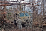 Soldiers with the Puerto Rico Army National Guard’s 190th Engineer Battalion work to clear a roadway in Cayey, Puerto Rico, in the aftermath of Hurricane Maria, Sept. 30, 2017. Back-to-back hurricanes that caused major destruction in Puerto Rico, the Virgin Islands and along the Gulf Coast region meant a busy hurricane season for Guard members. In total, more 45,000 Guard members from nearly every state, territory and the District of Columbia took part in response efforts in the aftermath of Hurricanes Harvey, Irma and Maria.