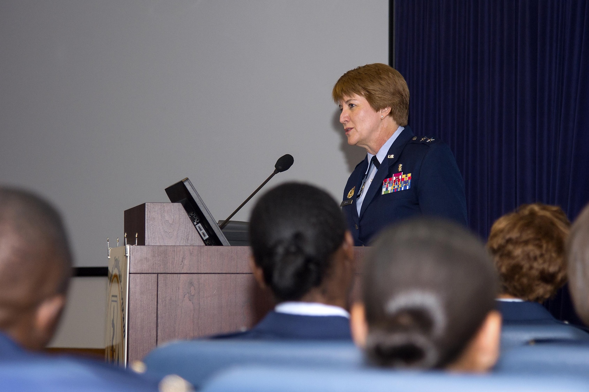 U.S. Air Force Major General Dorothy Hogg, the Deputy Surgeon General and Chief of the Air Force Nurse Corps, Office of the Surgeon General, Headquarters U.S. Air Force, Washington, D.C., speaks at the graduation ceremony of the Nurse Transitioning Program held at the Tampa General Hospital Nov. 29, 2017. During her speech, Hogg challenged the Airmen to provide evidence-based care to their patients, as well as to continue learning industry best practices