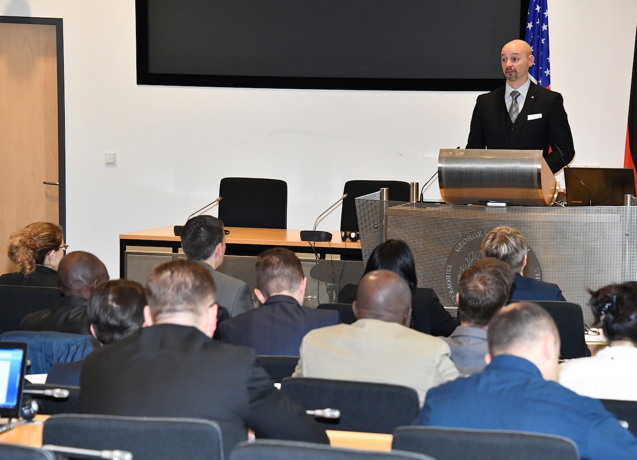 Assistant Special Agent Christopher Serdinak, who is in charge of the FBI’s counterterrorism program in Chicago, introduces his team of experts.
