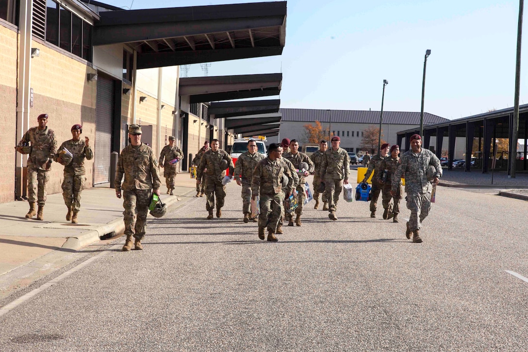 Soldiers prepare to donate toys for the 20th Annual Randy Oler Memorial Operation Toy Drop at Fort Bragg, N.C.