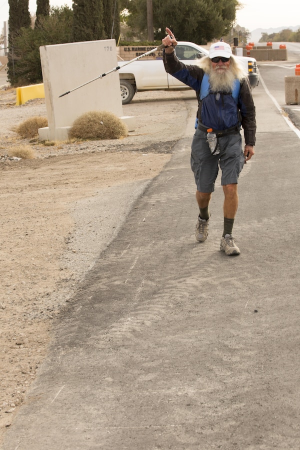 Sunny Eberhart completes his traversing of Marine Corps Logistics Base Barstow, Calif., Nov. 15 as another part of his mission to walk the entirety of Route 66 from Chicago to Santa Monica, Calif., a distance of 2,400 miles. Joseph Boll Avenue through the base is part of the iconic Mother Road.