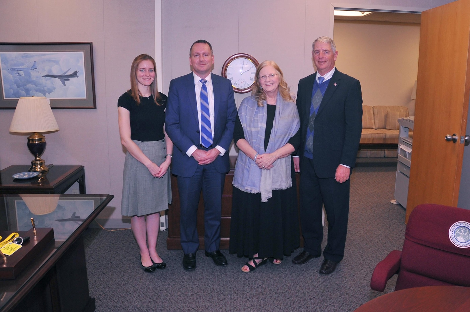 (Right to left) Dr. William Astley, U.S. Strategic Command (USSTRATCOM) resiliency coordinator, poses for a photo with his wife, Susanne; his son, Adam; and his daughter, Ariana, before his retirement ceremony at Offutt Air Force Base, Neb., Nov. 30, 2017. Astley retired after 36-plus years of service as an Air Force officer and government civilian. Dr. and Mrs. Astley’s other son, Abel (who lives in Huntington Beach, Calif.), was not present for the photo. Throughout his 11 years with USSTRATCOM, Astley led a team that developed several programs and activities to ensure members of the command remain sharp, fresh and productive. One of nine Department of Defense unified combatant commands, USSTRATCOM has global responsibilities assigned through the Unified Command Plan that include strategic deterrence, nuclear operations, space operations, joint electromagnetic spectrum operations, global strike, missile defense, and analysis and targeting.