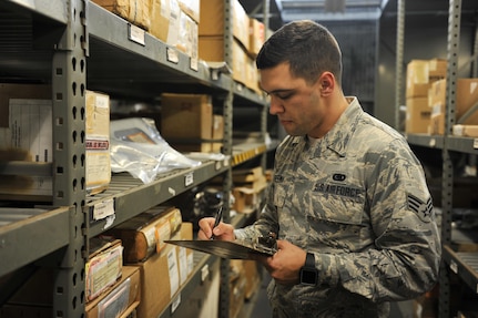 Senior Airman Ryan Deetman, 628th Logistics Readiness Squadron central storage journeyman, completes a validation checklist in LRS building T80 Nov. 30, 2017, at Joint Base Charleston, S.C.