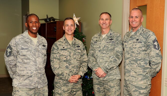 Col. James P. Ryan, the 157th Air Refueling Wing commander, and Col. Robert L. Hanovich, 22nd Operations Group commander, assigned to the 22nd Air Refueling Wing, McConnell Air Force Base, Kan., Chief Master Sgt. Gary A. Cabral, 64th Air Refueling Squadron chief enlisted manager, and Chief Master Sgt. Derrick W. Grant, the 22nd OG boom operator functional manager, pose for a group photo on November 29, 2017, at Pease Air National Guard Base, N.H. The senior leaders met to reinforce the bond between the two Wings as they prepare for the scheduled conversion to the KC-46A Pegasus. (N.H. National Guard photo by Staff Sgt. Kayla Rorick)