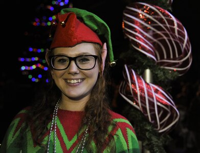 Airman 1st Class Jennifer Delawrence, 628th Force Support Squadron fitness apprentice, smiles in an elf costume at Joint Base Charleston – Weapons Station, S.C., Nov. 30, 2017.
