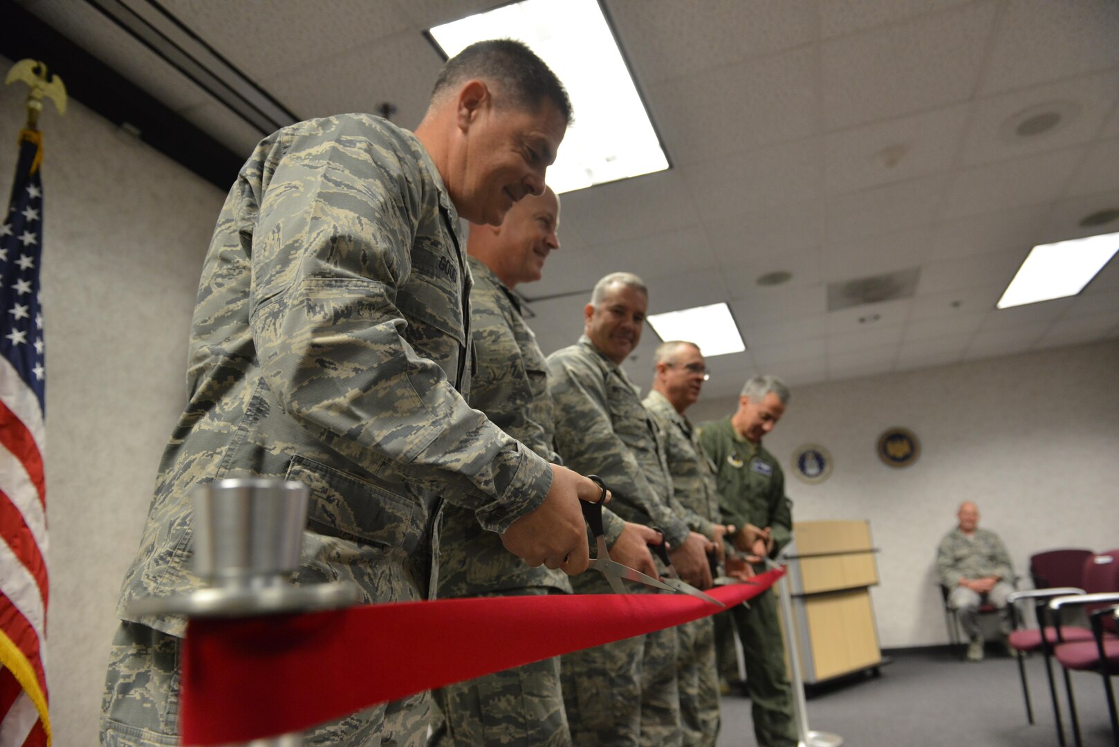 U.S. Air Force leaders within the combat communications community and Georgia Air National Guard cut the ribbon during a ribbon cutting ceremony for the new field training unit at the Savannah Air National Guard Base, Savannah, Ga., Nov. 28, 2017. (U.S. Air National Guard photo by Tech. Sgt. Amber Williams)