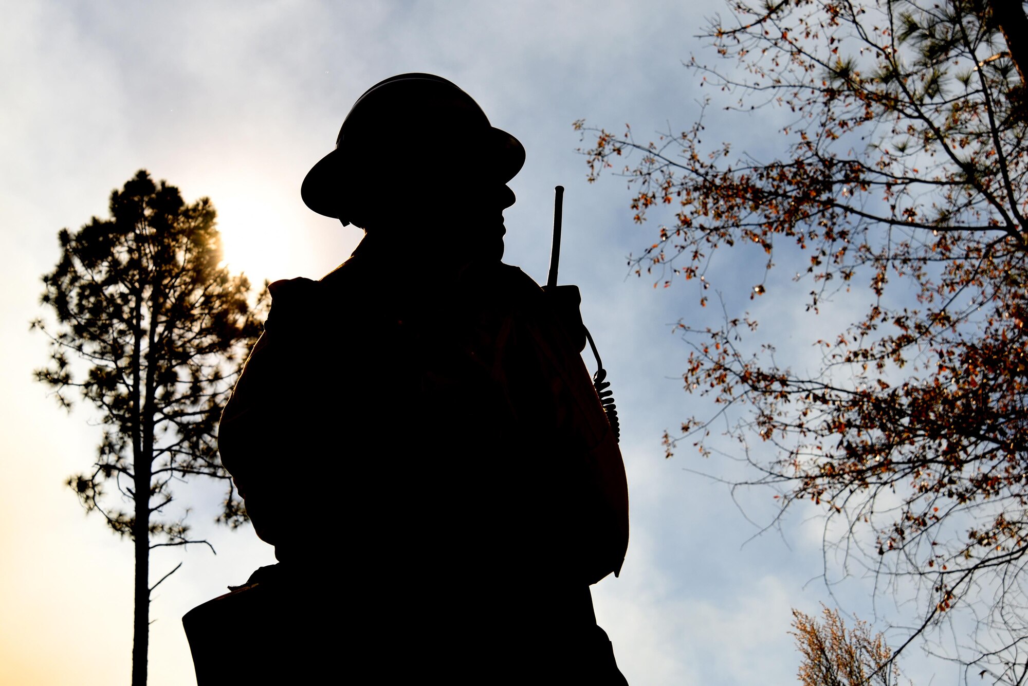 U.S. Air Force Airman 1st Class Richard Palmer, 20th Civil Engineer Squadron (CES) firefighter, monitors a prescribed fire at Poinsett Electronic Combat Range near Wedgefield, South Carolina, Nov. 29, 2017.
