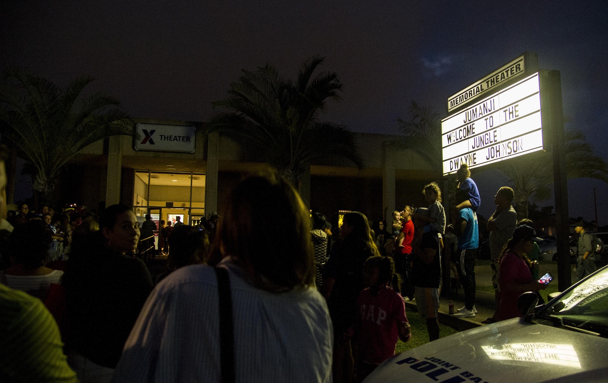 Hundreds of people gather at Hickam Memorial Theater for an advance screening of “Jumanji: Welcome to the Jungle”, at Joint Base Pearl Harbor-Hickam, Hawaii, Nov. 29, 2017.  Army & Air Force Exchange Service hosted the event, in partnership with Sony Pictures and the USO, as a thank you to service members and their families. (U.S. Air Force photo by Tech. Sgt. Heather Redman)